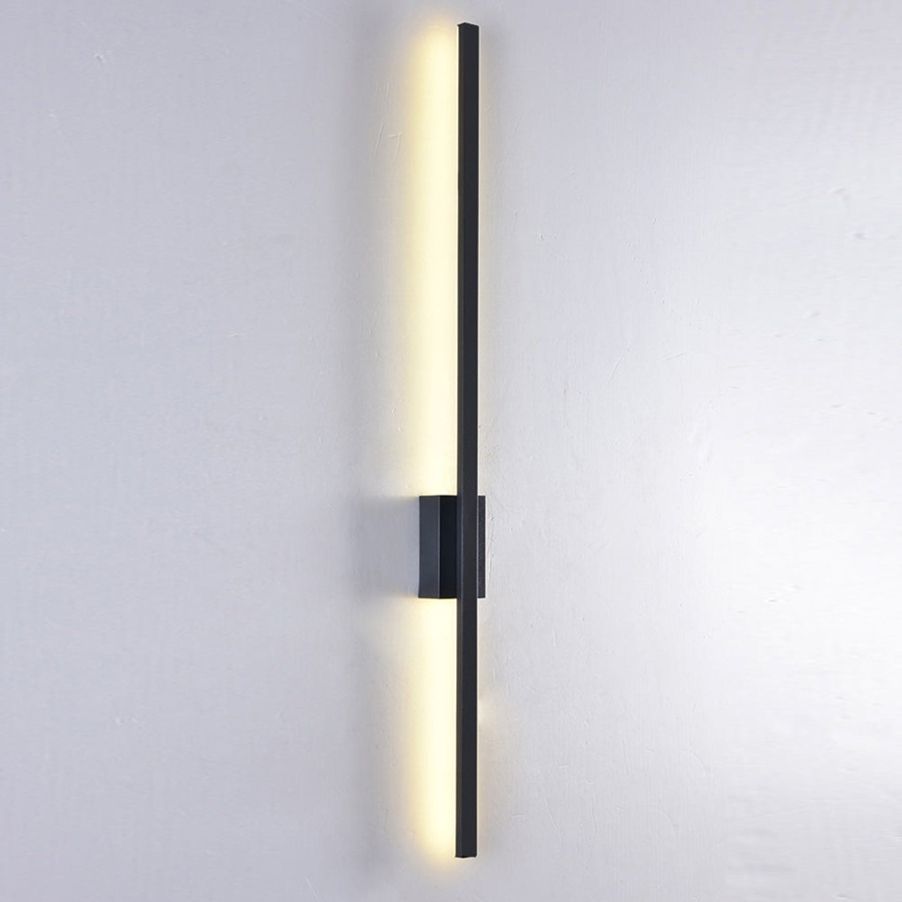 Minimalist Linear Wall Light With Warm LED Glow in Black — Halden Lighting