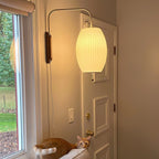 Retro Silk and Walnut Wall Light With Warm LED Glow — Halden Lighting