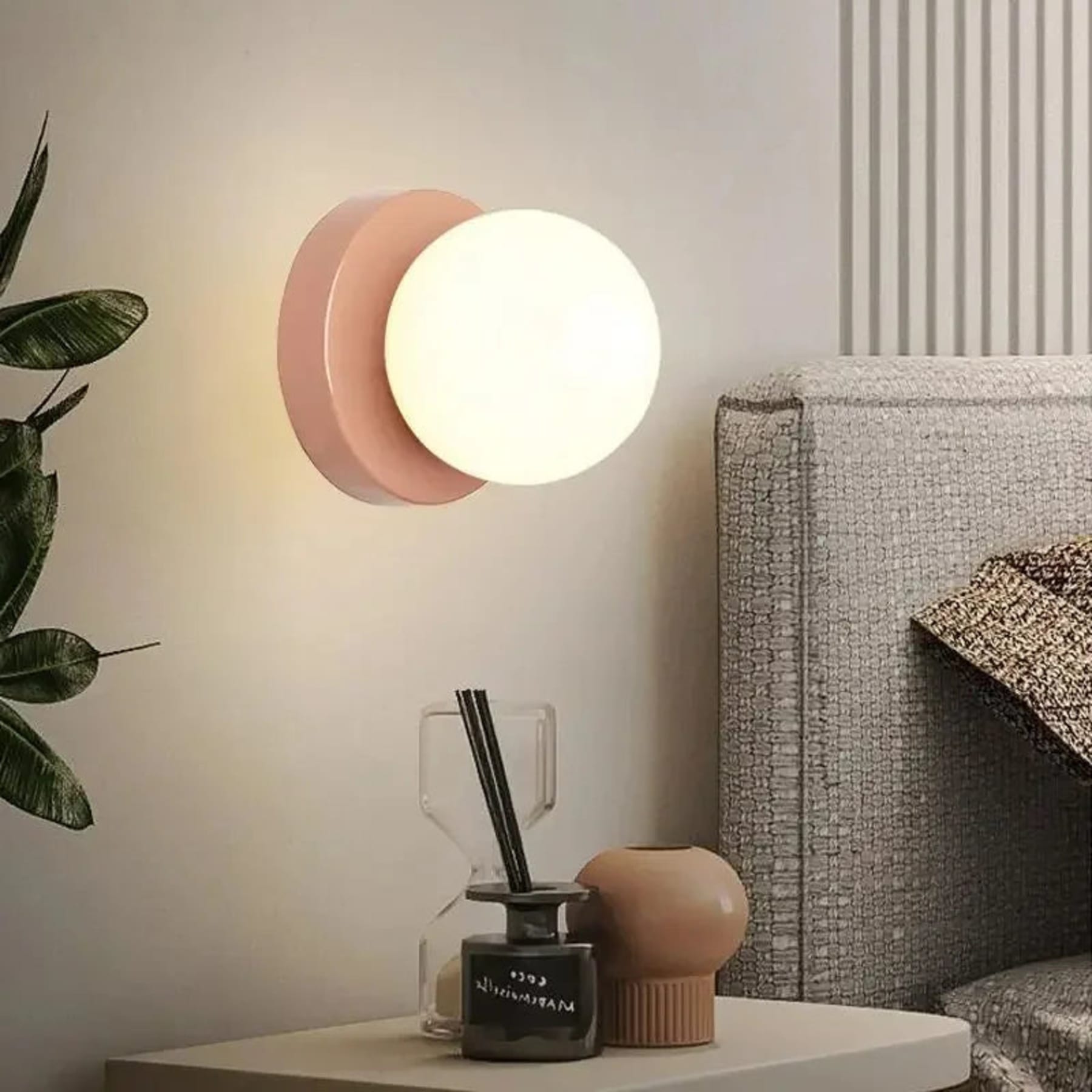 Modern Glass Wall Light With Warm LED Glow in Pink — Halden Lighting