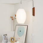Retro Silk and Walnut Wall Light With Warm LED Glow — Halden Lighting